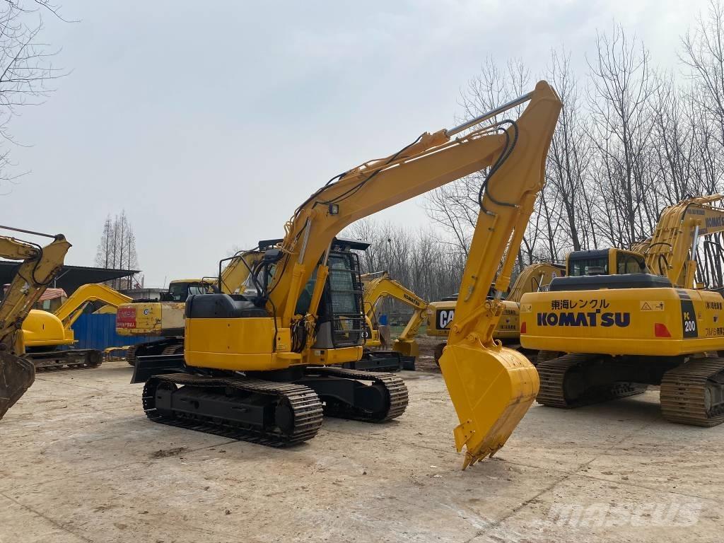 Komatsu PC128US Escavadoras de rastos