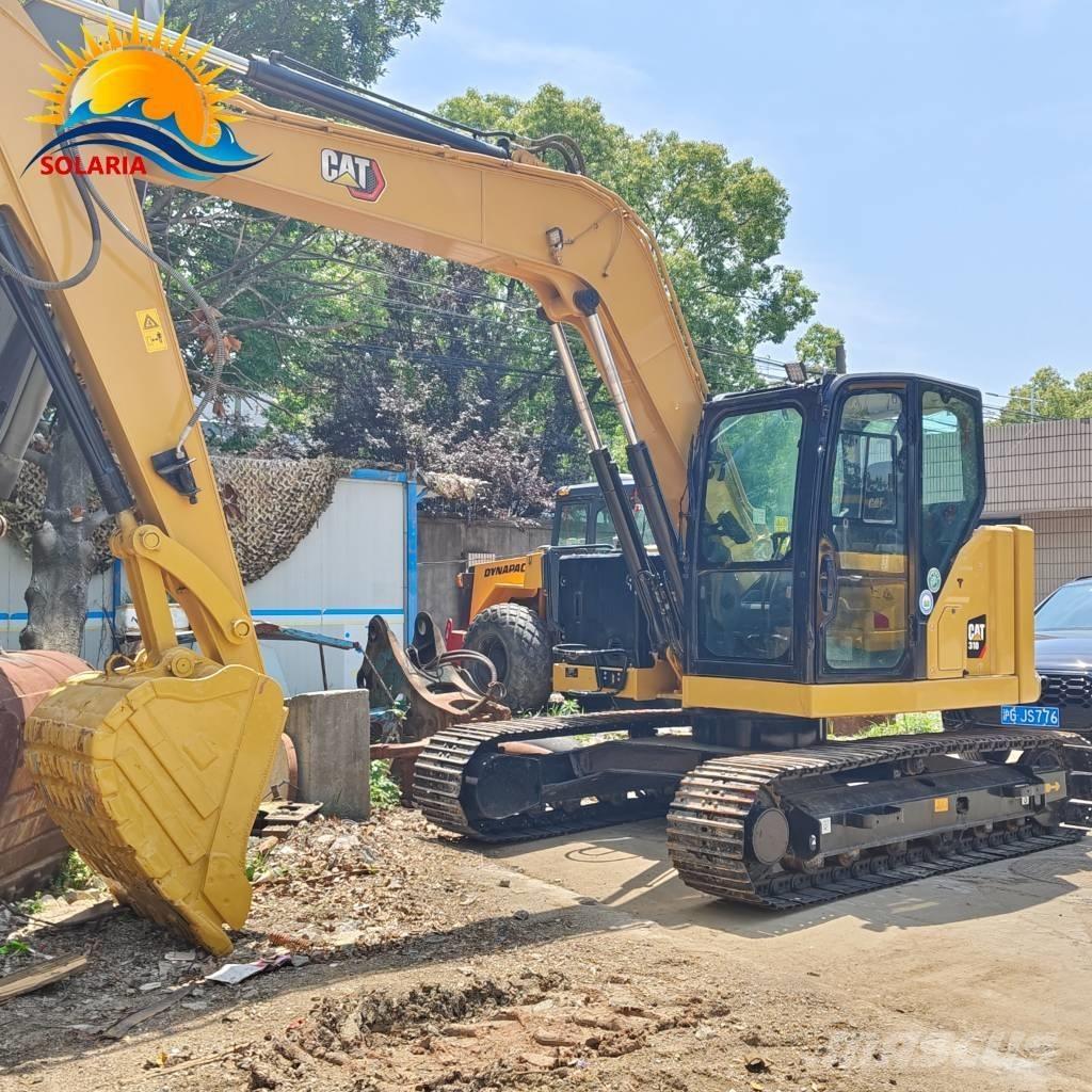 CAT 310 Escavadoras de rastos