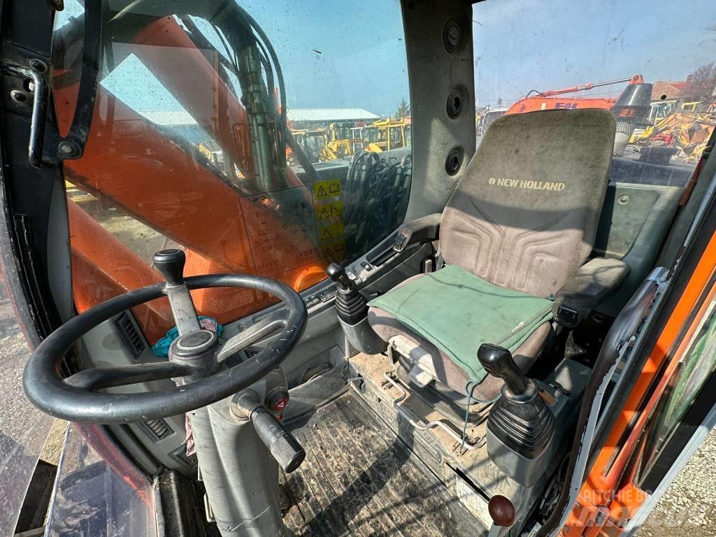New Holland MH Plus Escavadoras de rodas