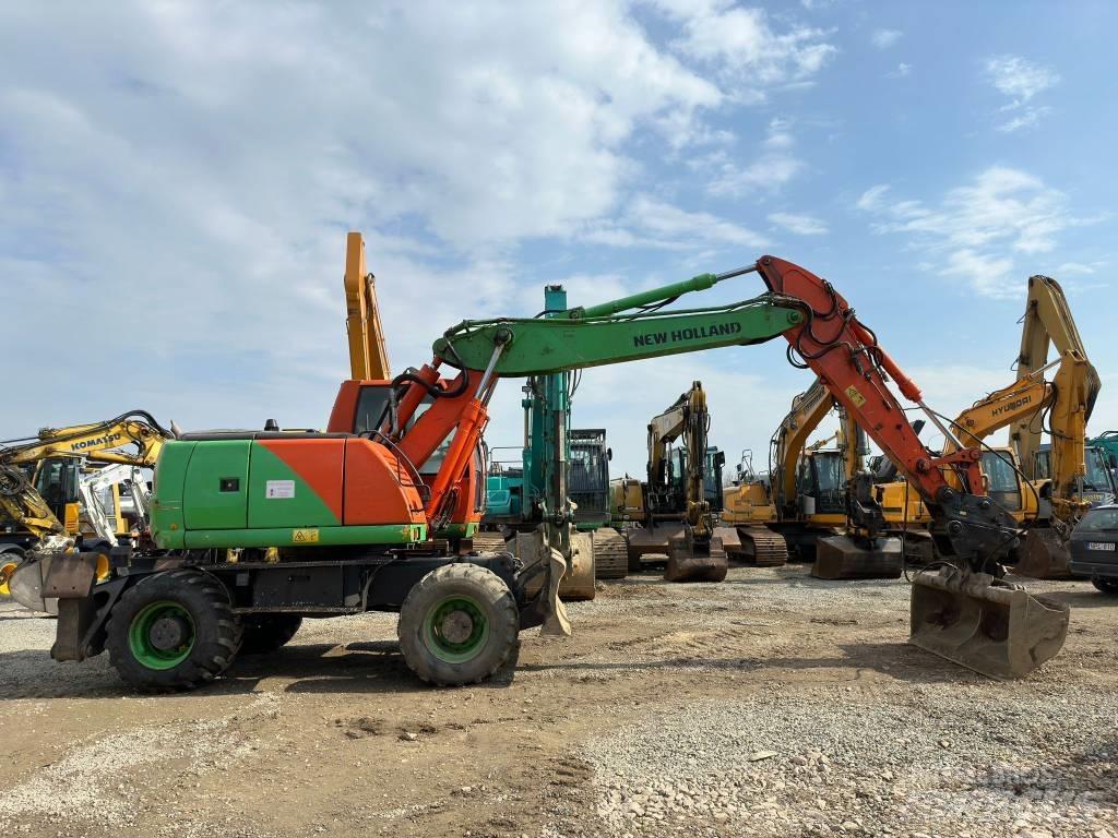 New Holland MH Plus Escavadoras de rodas