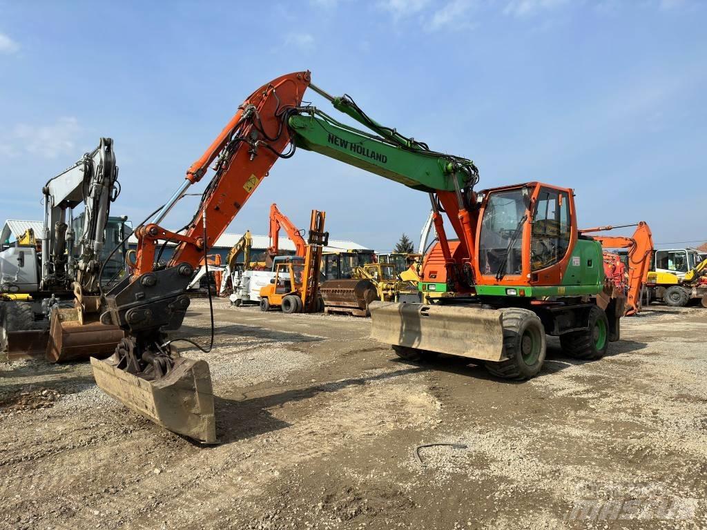 New Holland MH Plus Escavadoras de rodas