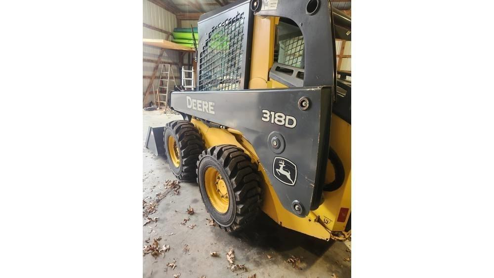 John Deere 318 D Carregadoras de direcção deslizante