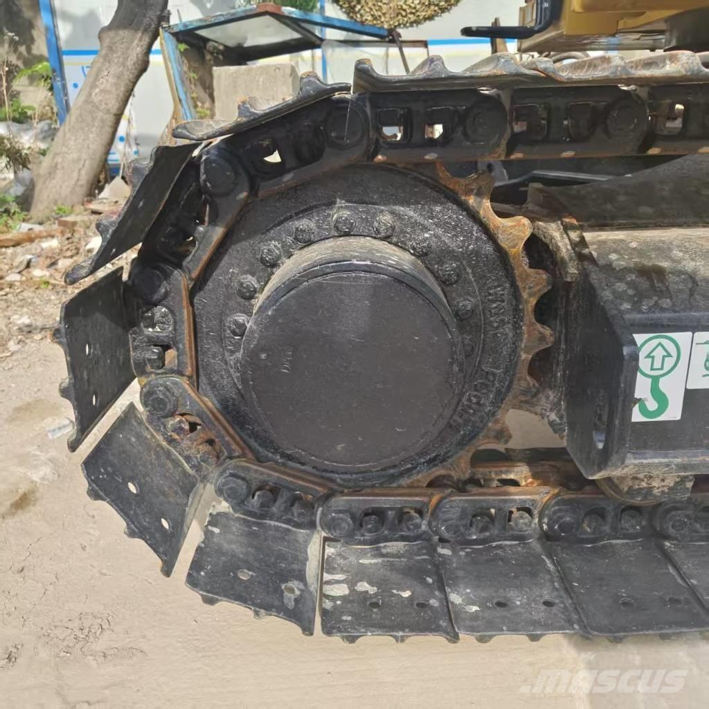 CAT 310 Escavadoras de rastos