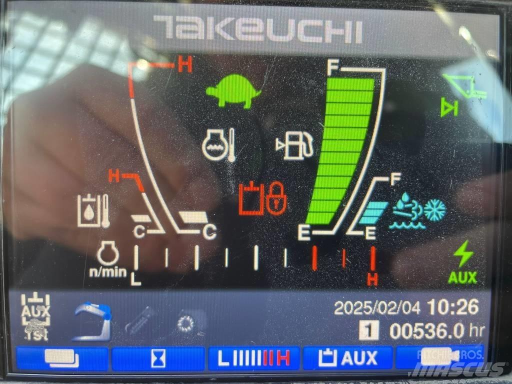 Takeuchi TL12 Carregadoras de direcção deslizante