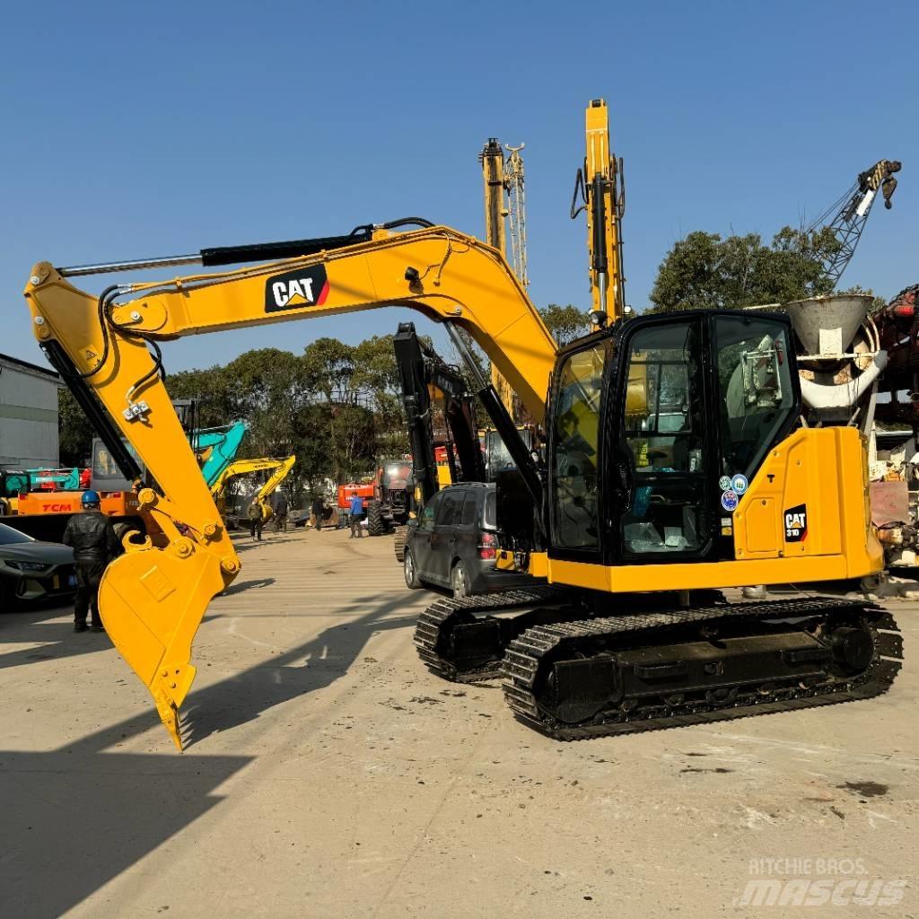 CAT 310 Escavadoras de rastos