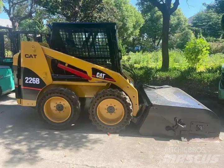 Cata-Dyne 226B Carregadoras de direcção deslizante