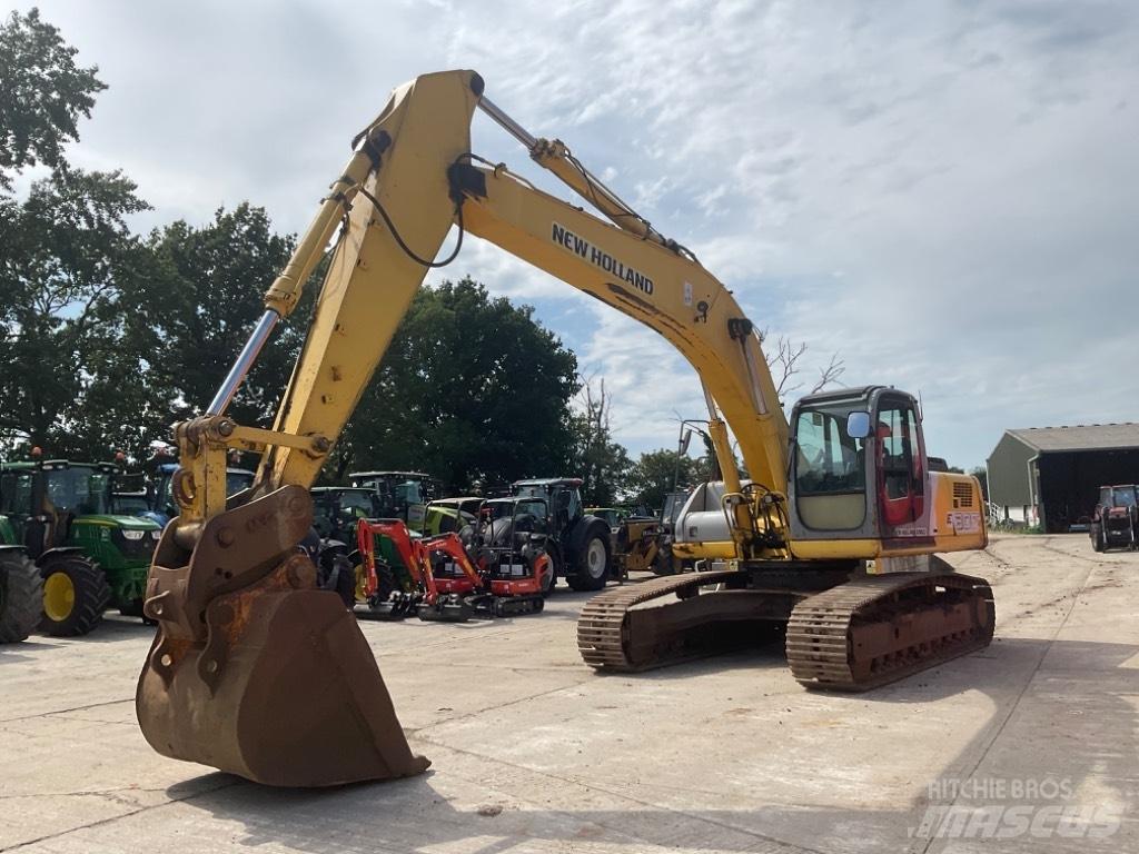 New Holland E 305 Escavadoras de rastos