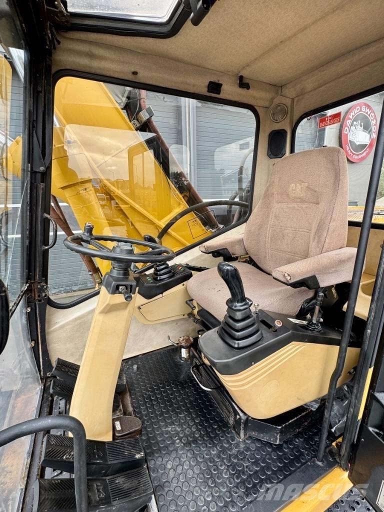 CAT M 318 Escavadoras de rodas