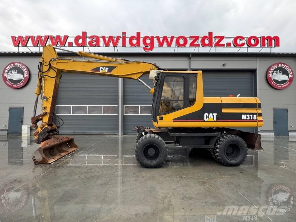 CAT M 318 Escavadoras de rodas