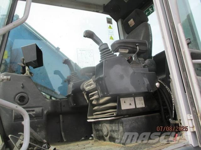 Fuchs MHL 320 Manipuladores de resíduos / indústria