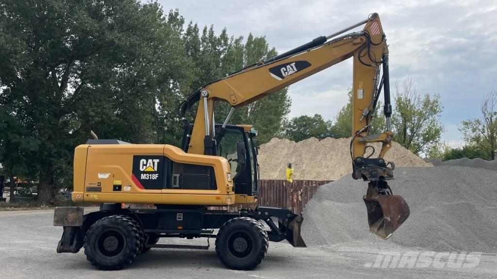CAT M 318 F Retroescavadoras