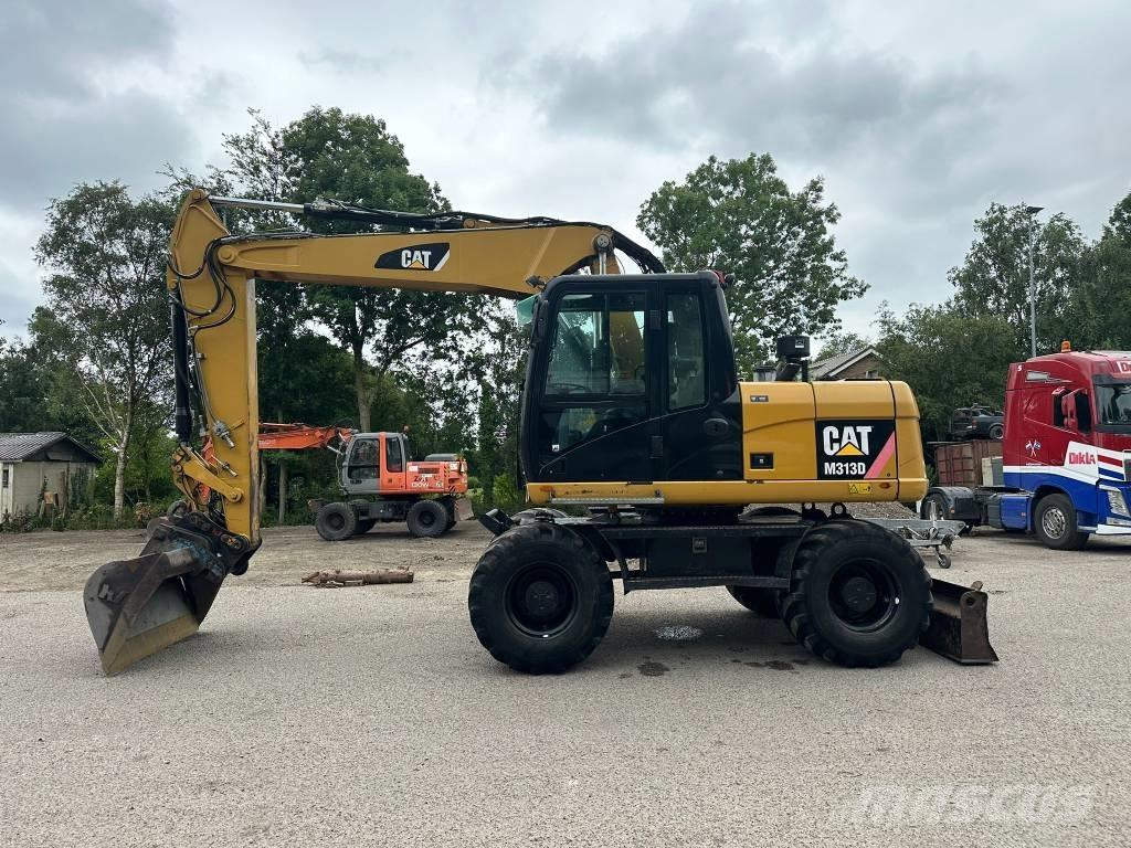 CAT M 313 D Escavadoras de rodas