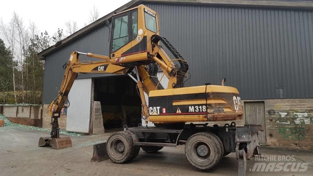 CAT M 318 Manipuladores de resíduos / indústria