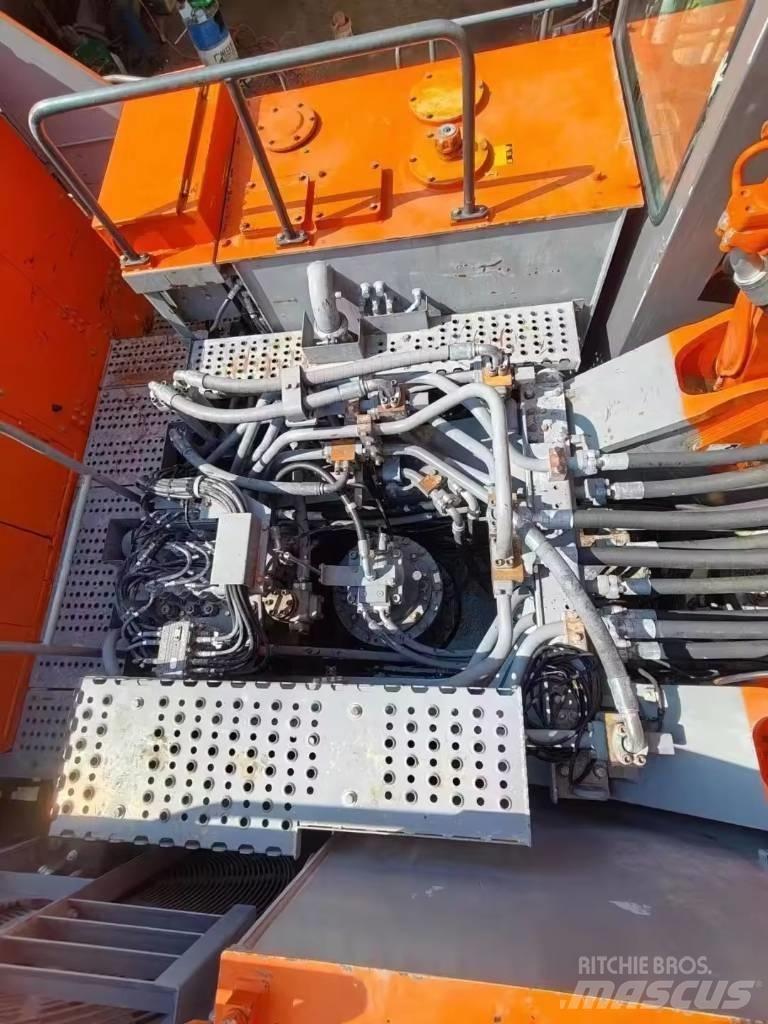 Hitachi EX 1200 Escavadoras de rastos