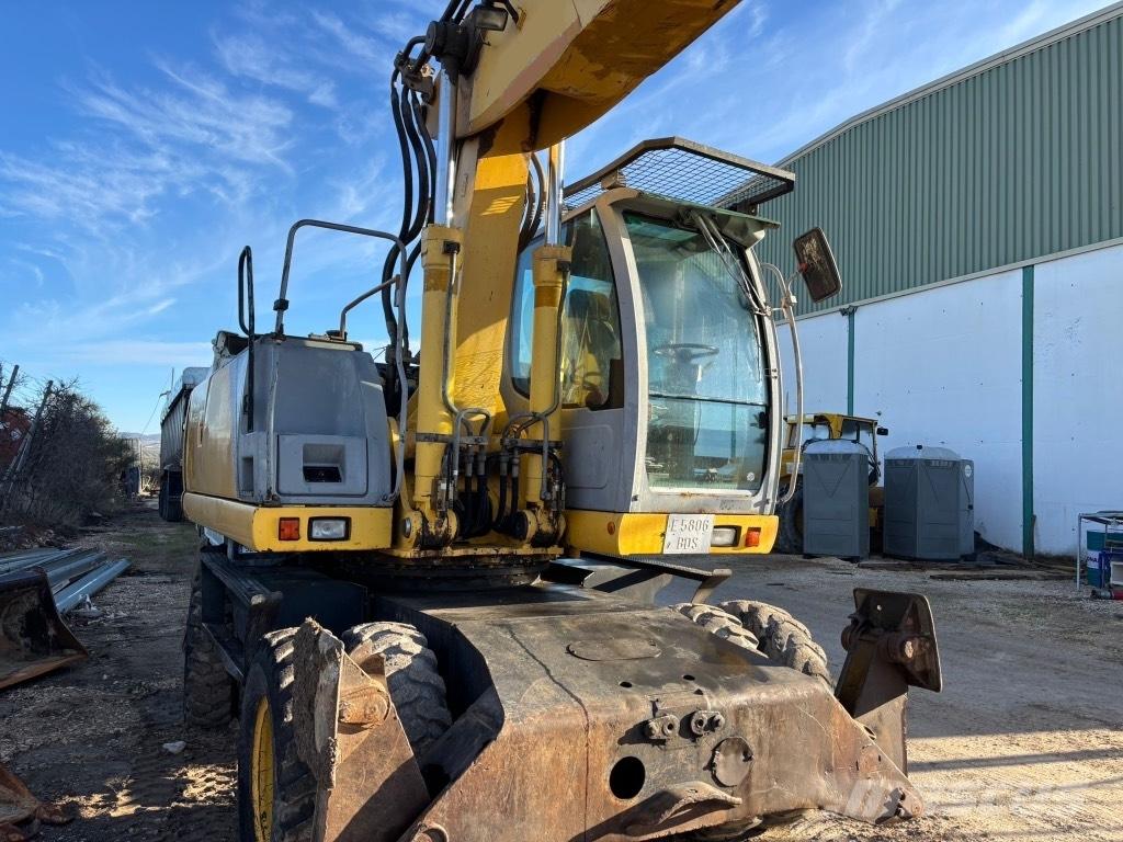 New Holland MH 6.6 Escavadoras de rodas