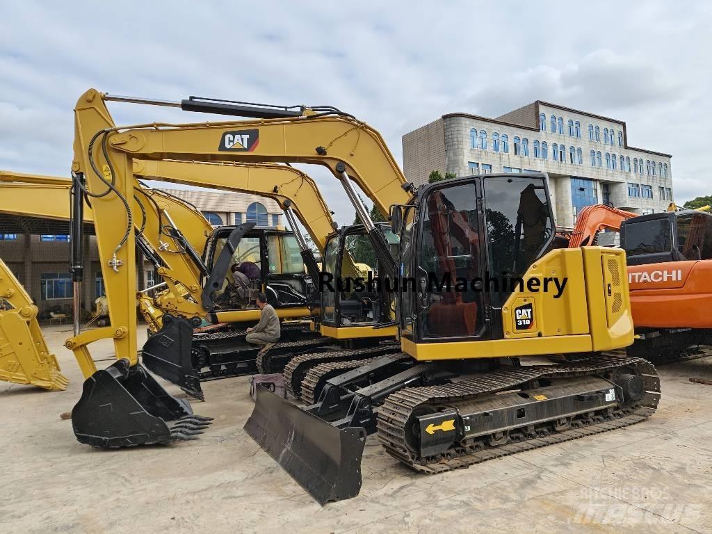 CAT 310 Escavadoras de rastos