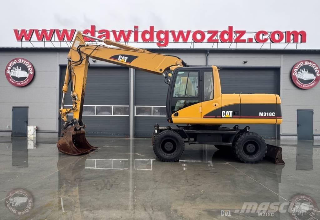 CAT M 318 C Escavadoras de rodas