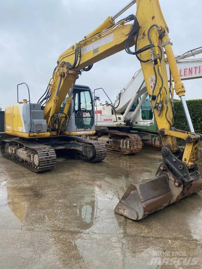 New Holland E 145 Escavadoras de rastos