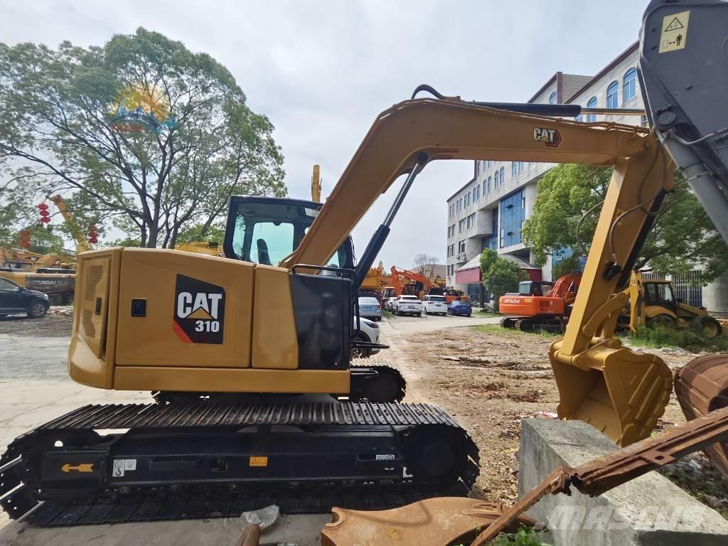 CAT 310 Escavadoras de rastos