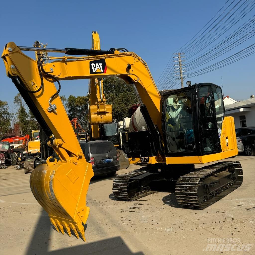 CAT 310 Escavadoras de rastos