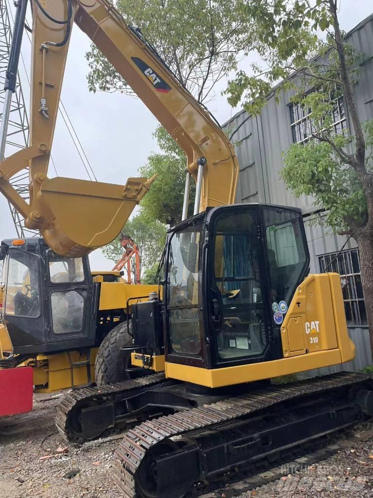 CAT 310 Escavadoras de rastos