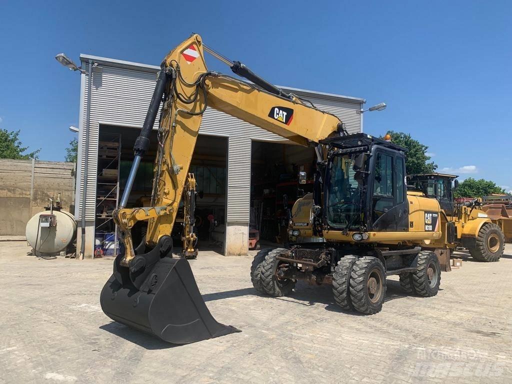 CAT M 318 D Escavadoras de rodas
