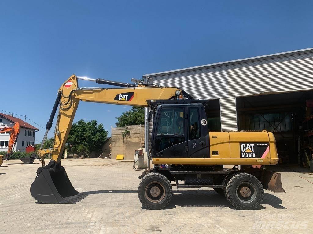 CAT M 318 D Escavadoras de rodas