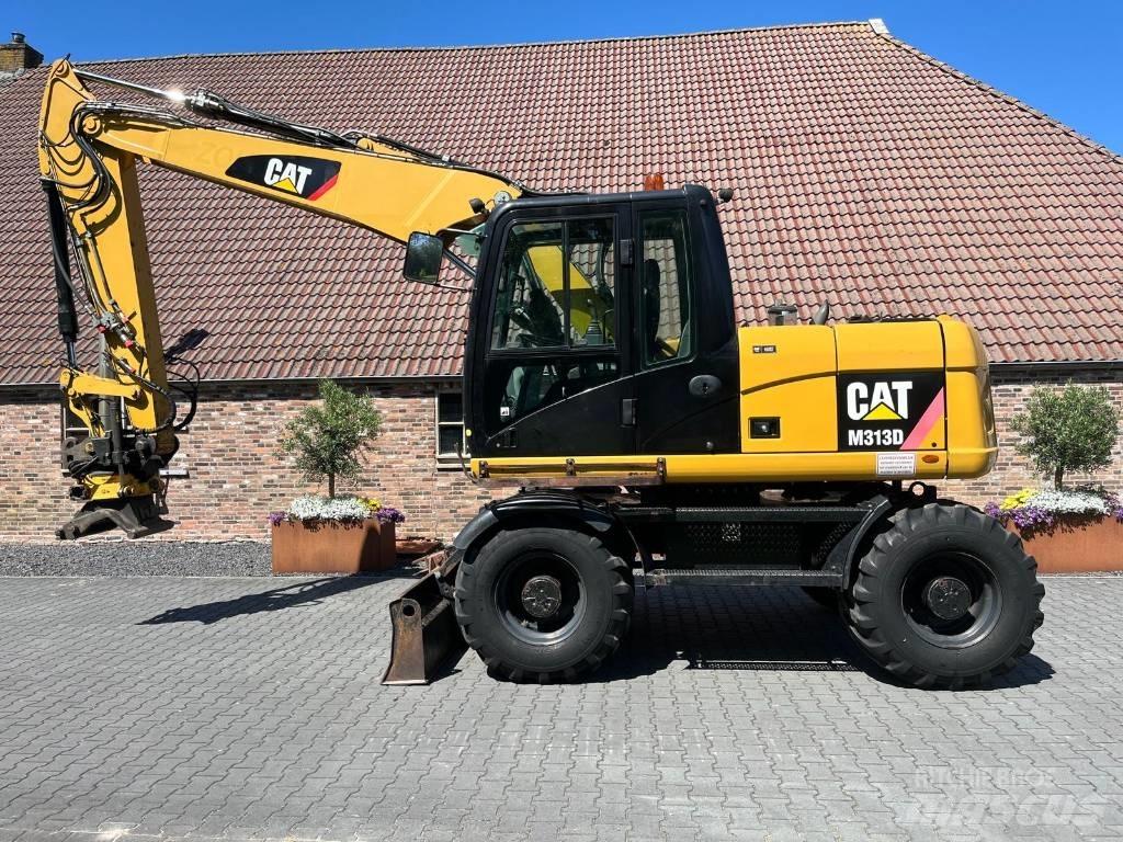 CAT M 313 D Escavadoras de rodas