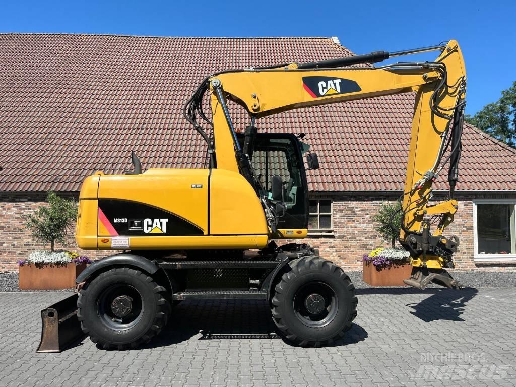 CAT M 313 D Escavadoras de rodas