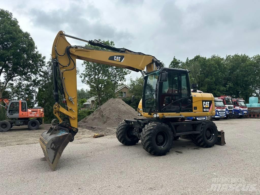 CAT M 313 D Escavadoras de rodas