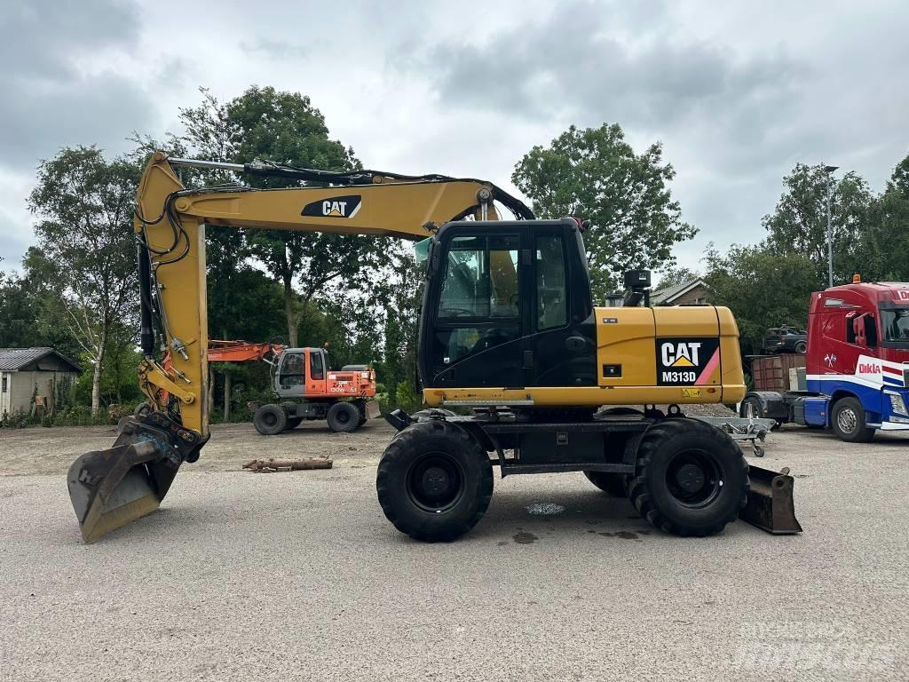 CAT M 313 D Escavadoras de rodas