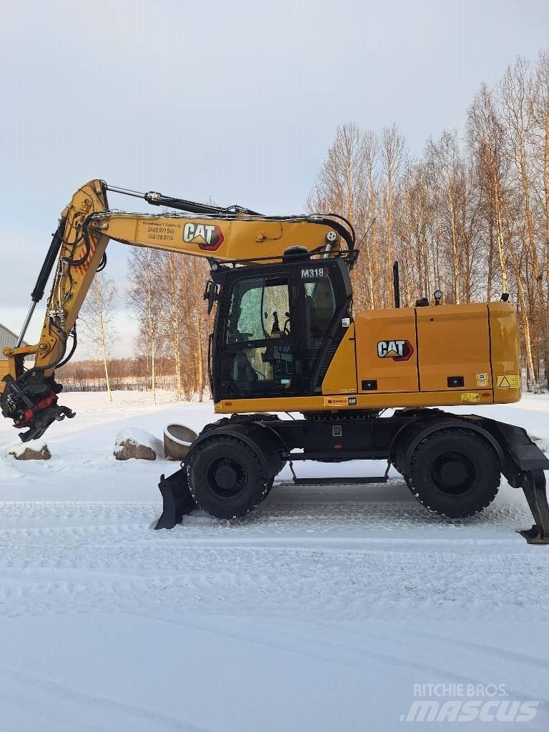 CAT M 318 Escavadoras de rodas