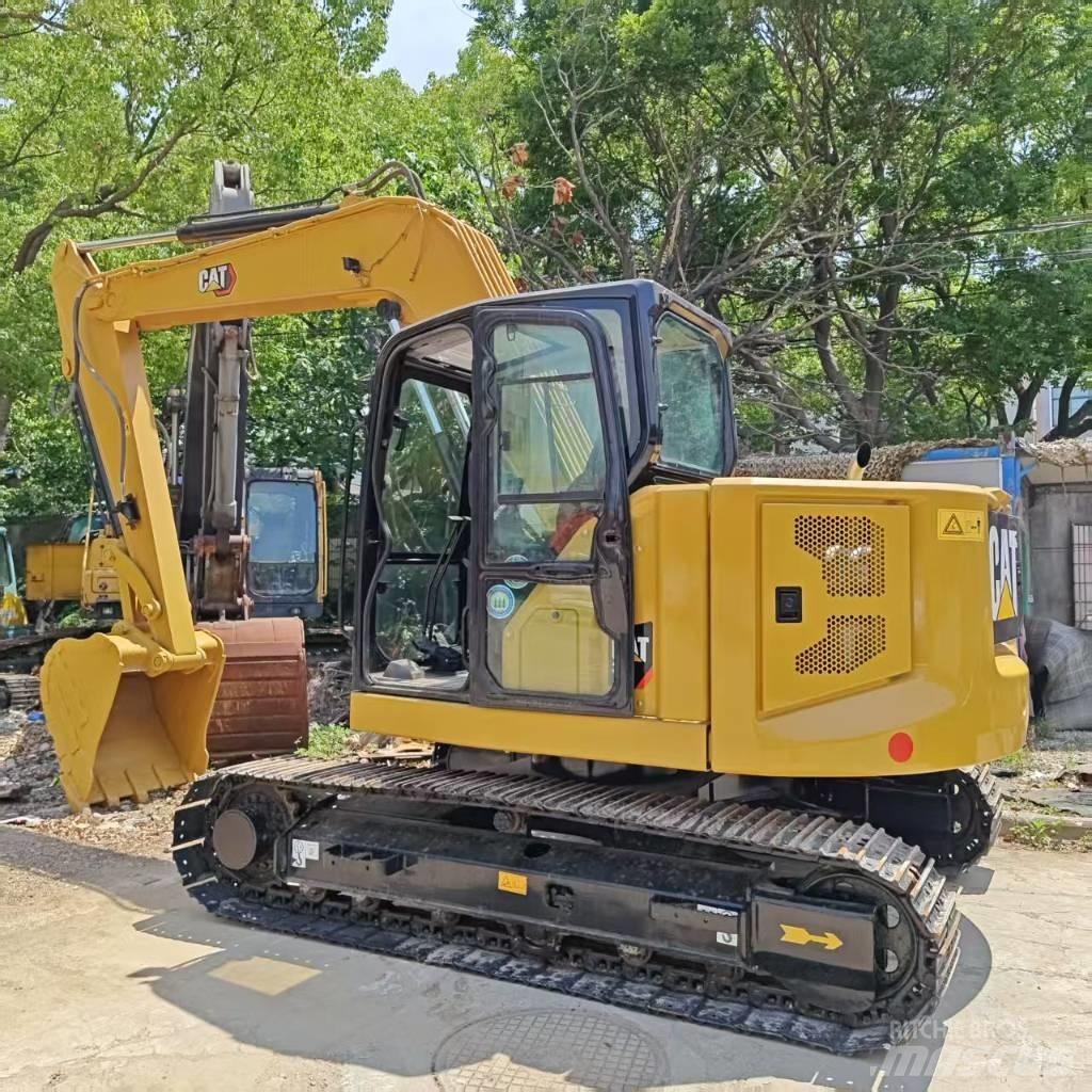 CAT 310 Escavadoras de rastos