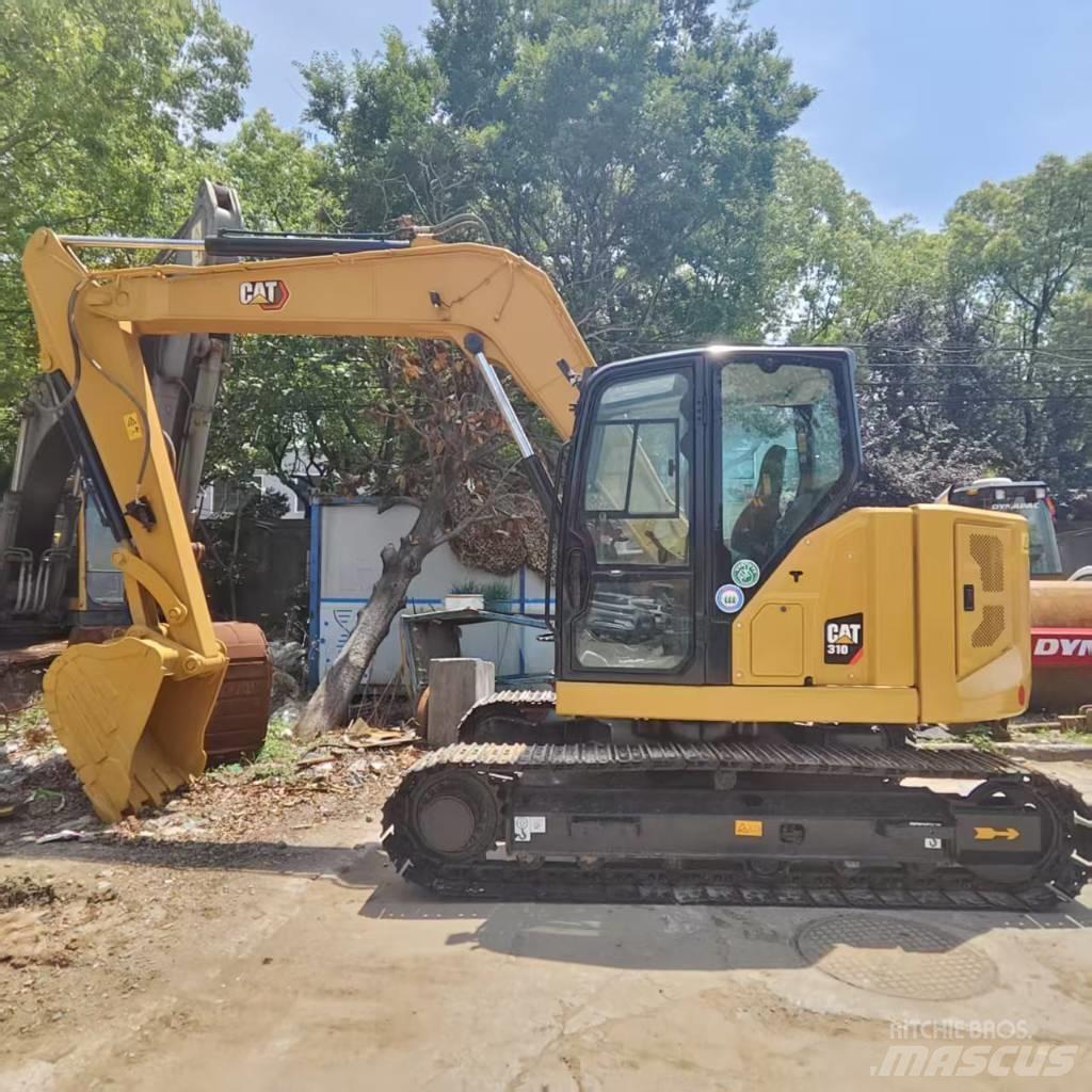 CAT 310 Escavadoras de rastos