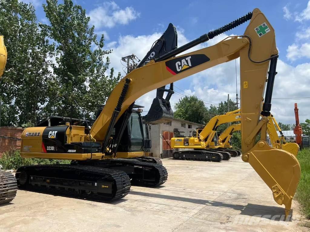 CAT cat323d Escavadoras Midi 7t - 12t