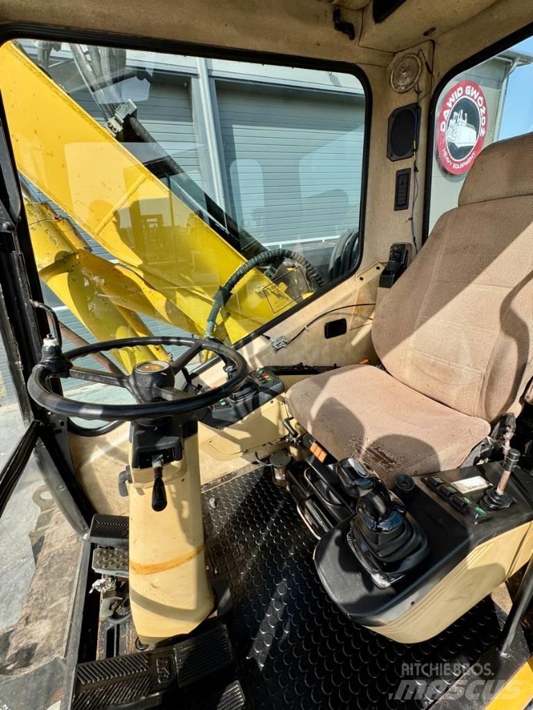 CAT M 312 Escavadoras de rodas