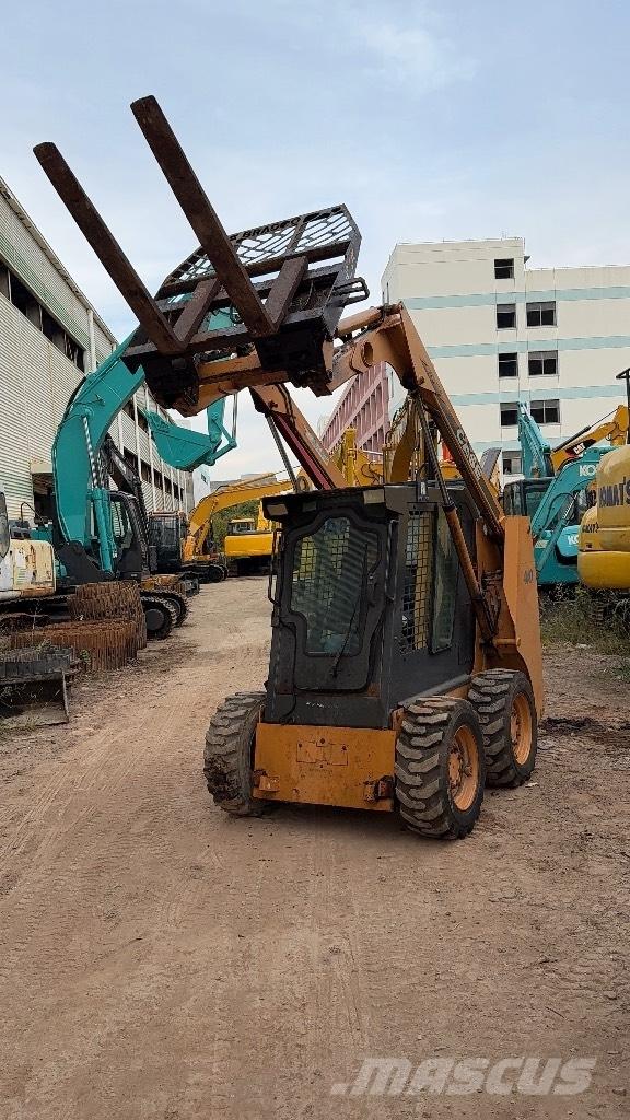 CASE 410 Carregadoras de direcção deslizante