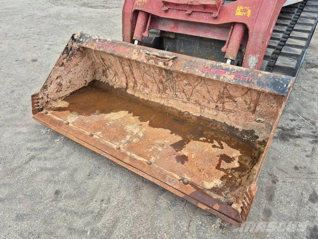 Takeuchi TL12 Carregadoras de direcção deslizante