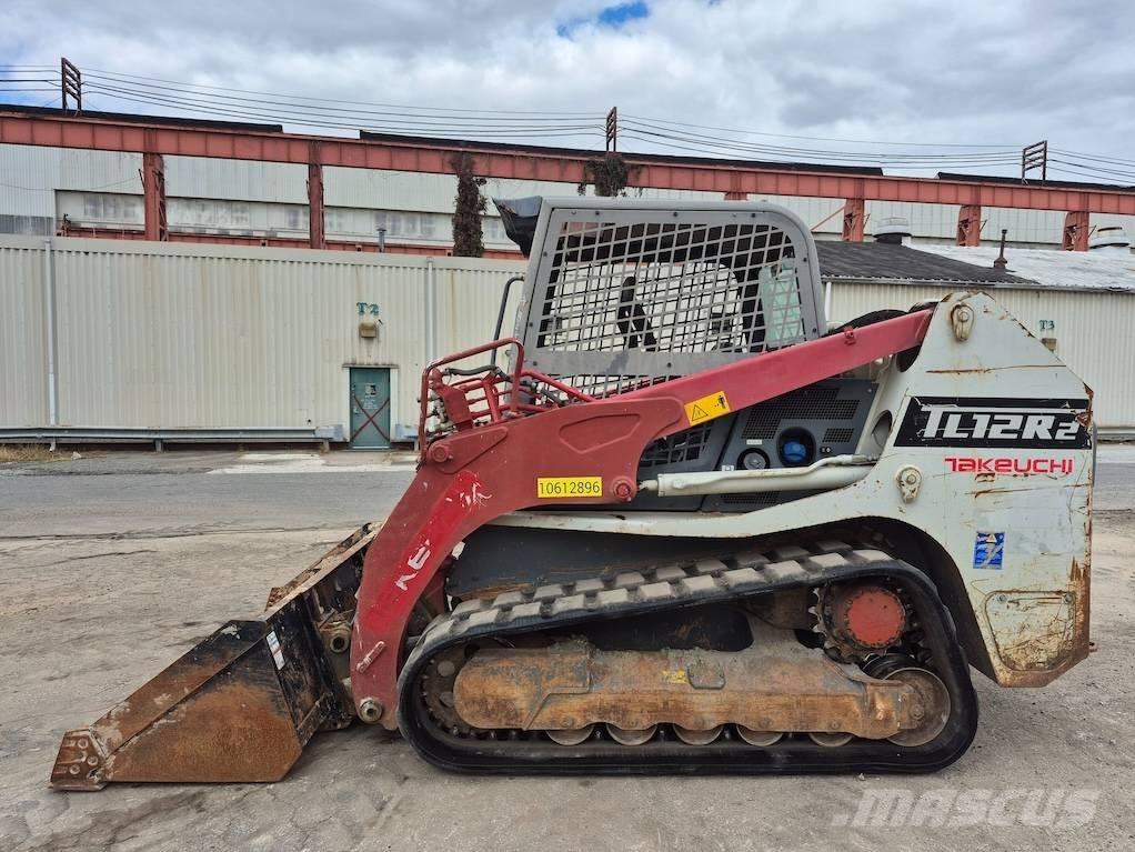 Takeuchi TL12 Carregadoras de direcção deslizante