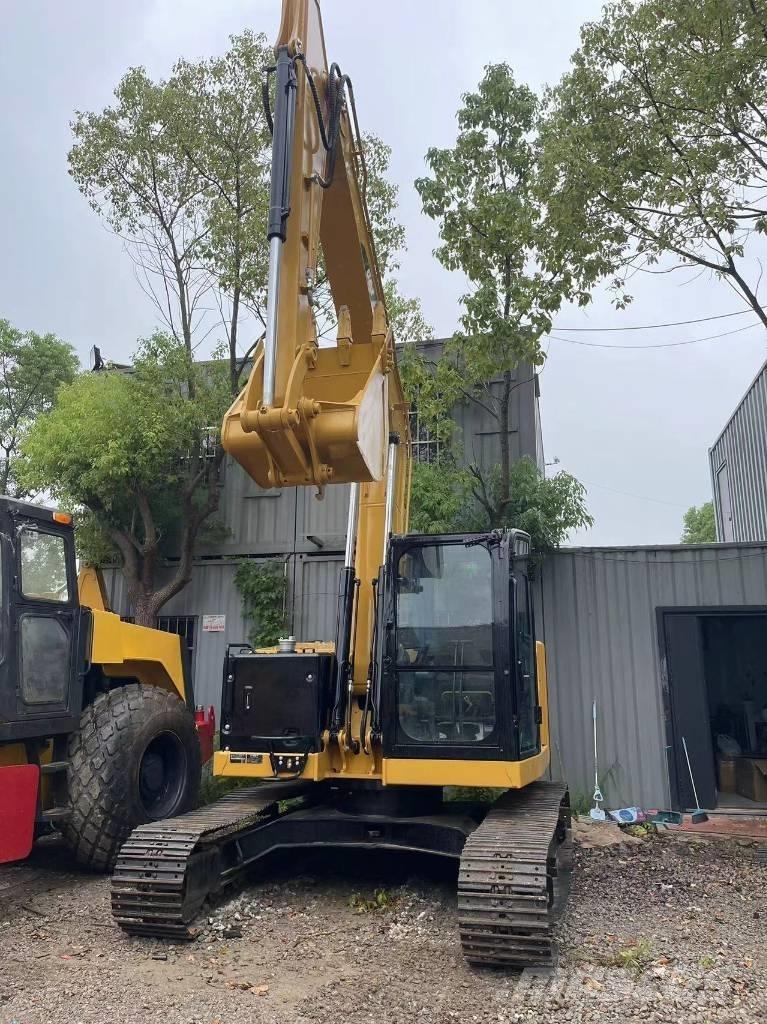 CAT 310 Escavadoras de rastos