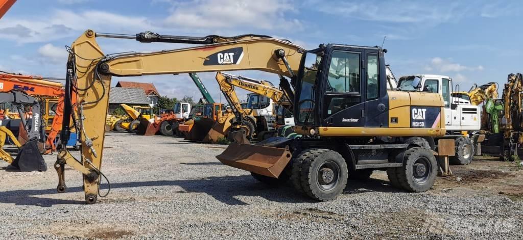 CAT M 315 D Escavadoras de rodas