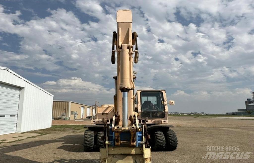 John Deere 595 Escavadoras de rodas