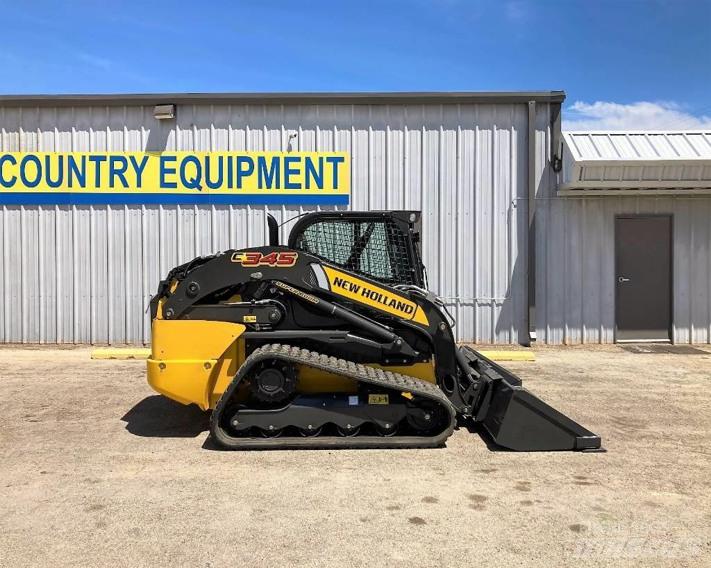 New Holland C 345 Carregadoras de direcção deslizante