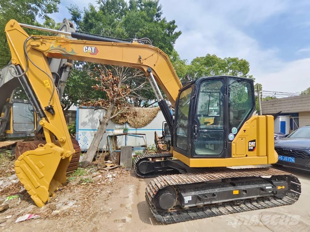 CAT 310 Escavadoras de rastos
