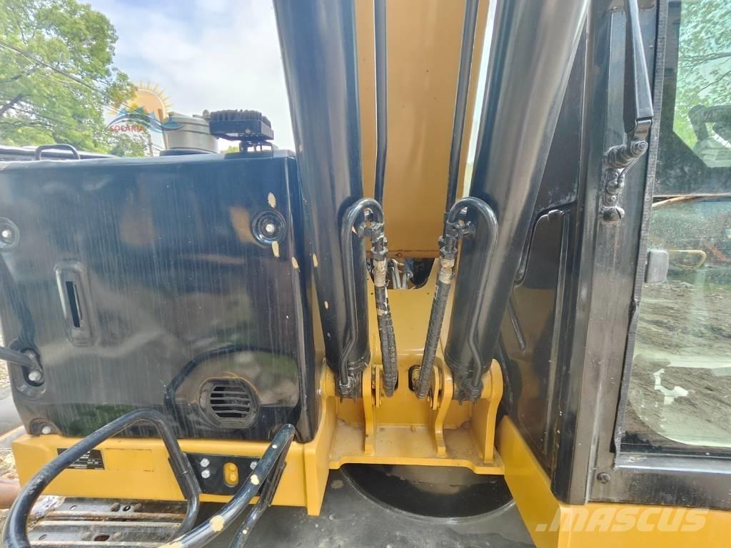 CAT 310 Escavadoras de rastos
