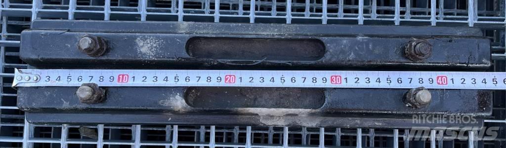  TXD 450A Rastos, correntes e material rodante