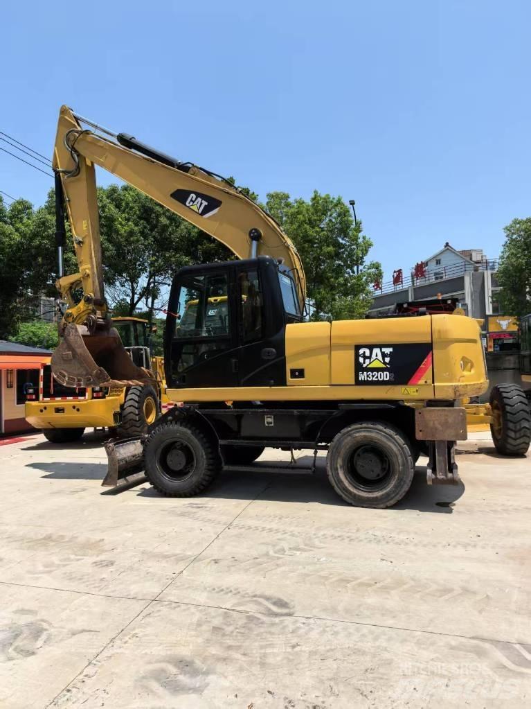CAT M 320 Escavadoras de rodas