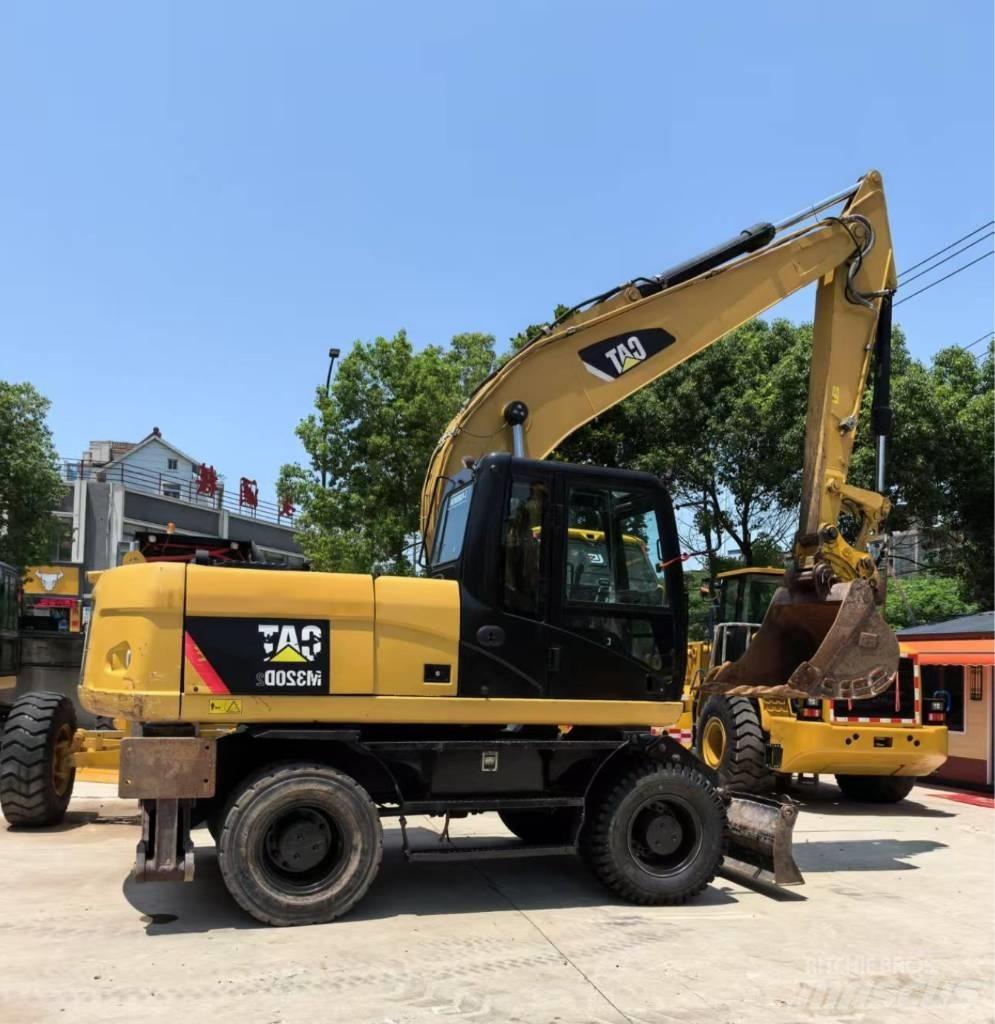 CAT M 320 Escavadoras de rodas