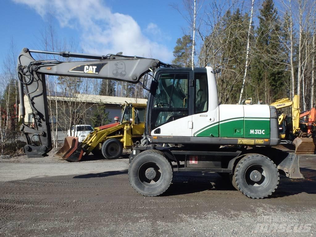 CAT M 313 C 4x4 Escavadoras de rodas