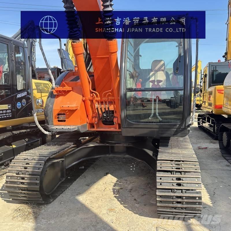 Hitachi ZX 135 US Escavadoras de rastos